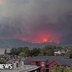 Thousands forced to evacuate as crews battle raging Canadian wildfires