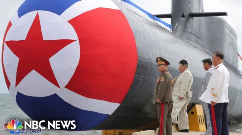 Kim Jong Un launching new submarine shown on North Korean TV