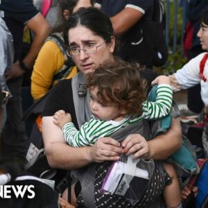 Americans wait in Haifa, Israel, for a ship to evacuate them to Cyprus