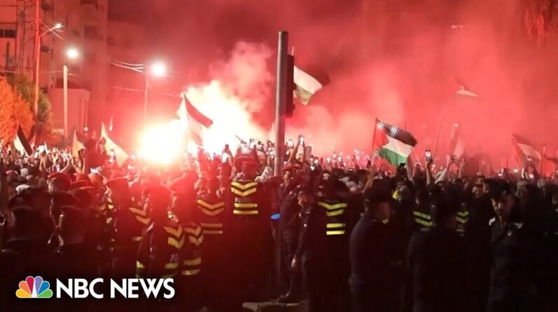 Thousands of protesters try to march on the Israeli Embassy in Amman