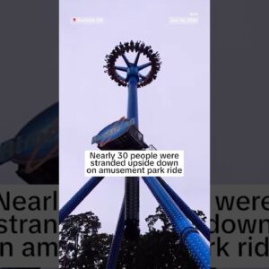 Nearly 30 people were stranded upside down on amusement park ride